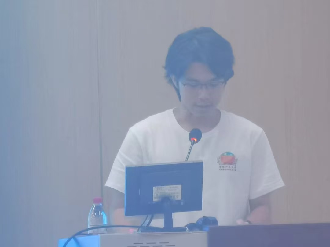 Yilong Wu speaking at the closing ceremony.