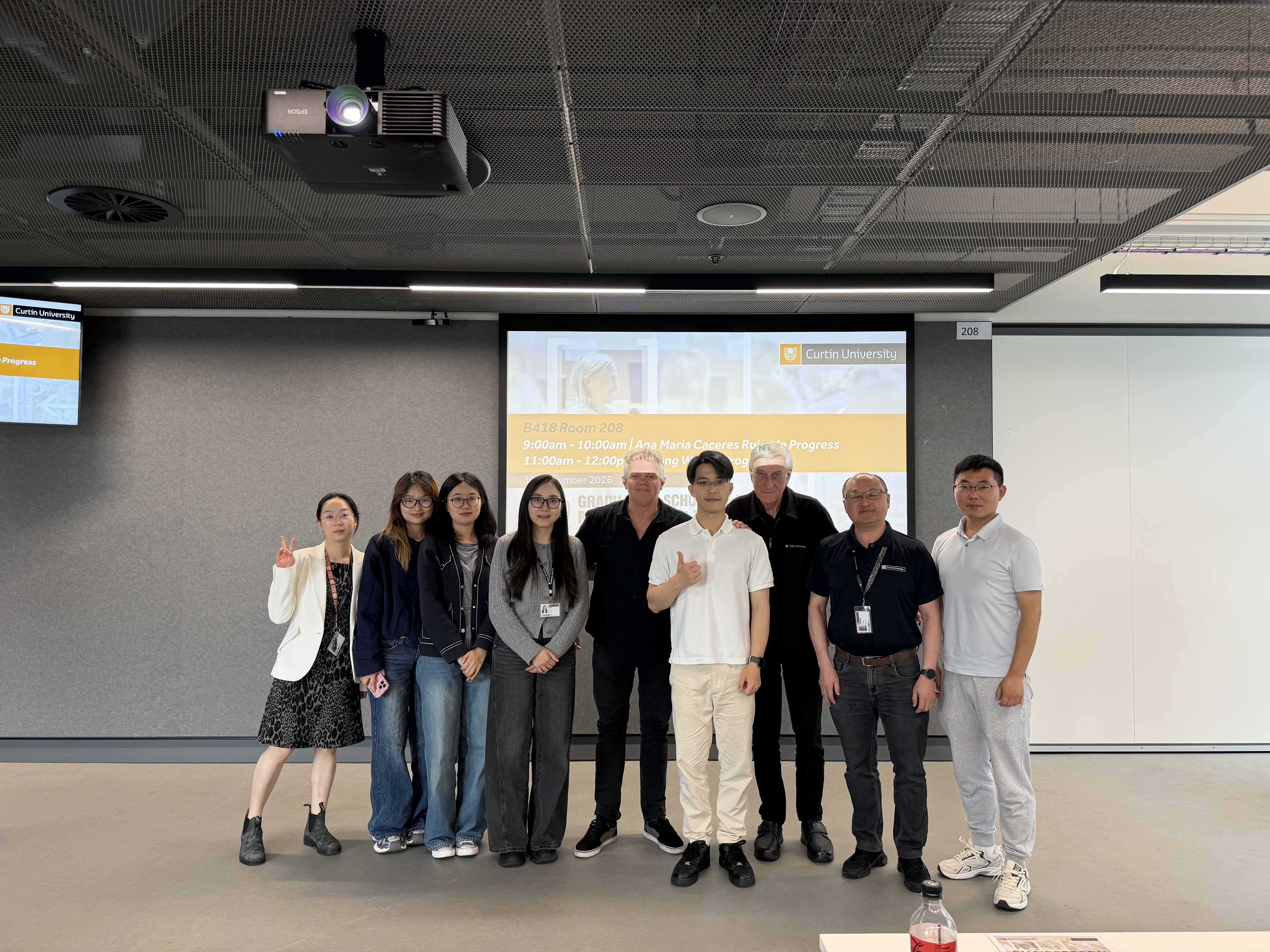 Group photo with some lab members, supervisor Yongze Song, chair Doug Thomas, reviewers Shengping Li and Peter Newman, and Qindong Li at Curtin University's GRX In Progress session.